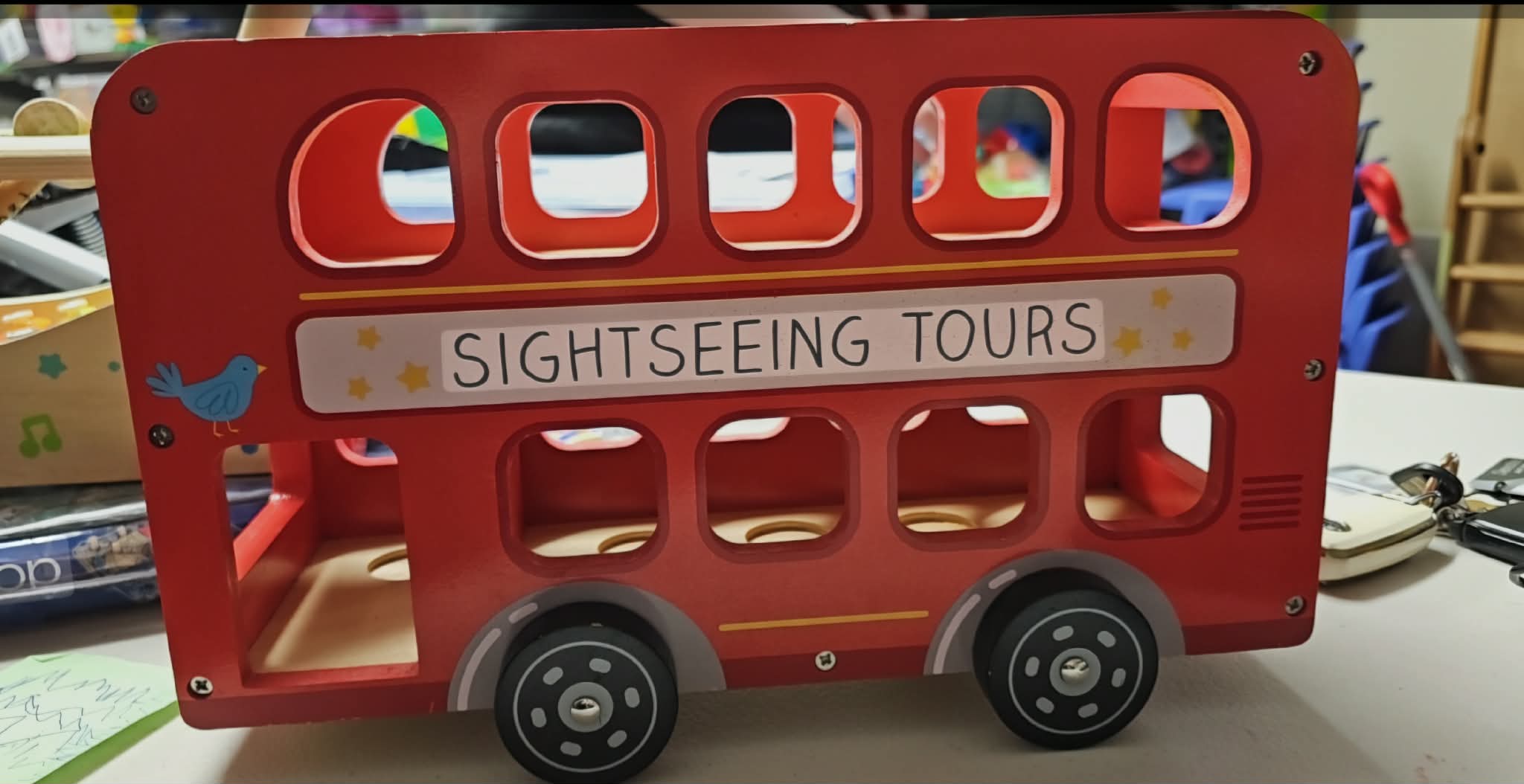 Red Tour Bus and People